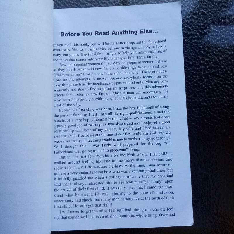 Essential Guide for Dads: "What Nobody Tells a New Father" by Alan Hosking