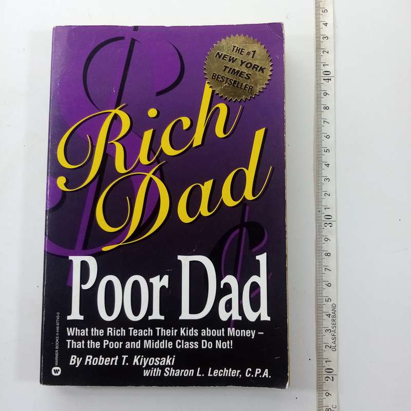 Rich Dad Poor Dad  Robert Kiyosaki & Sharon Lechter (Paperback)