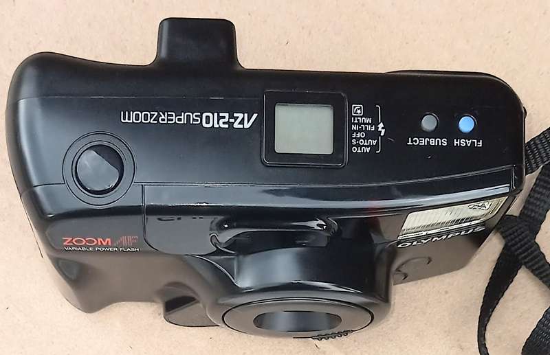 Olympus AZ-210 Super Zoom AF 38-76mm Variable Power Flash 35mm Film Camera in Working Condition