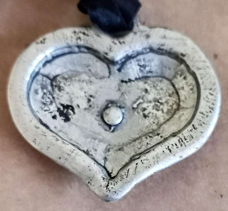 Silver Tone Metal Vintage German Made Heart pendant with edelweiss. 5cm x 5.5cm
