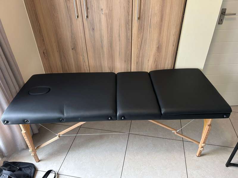 Massage table with accessories