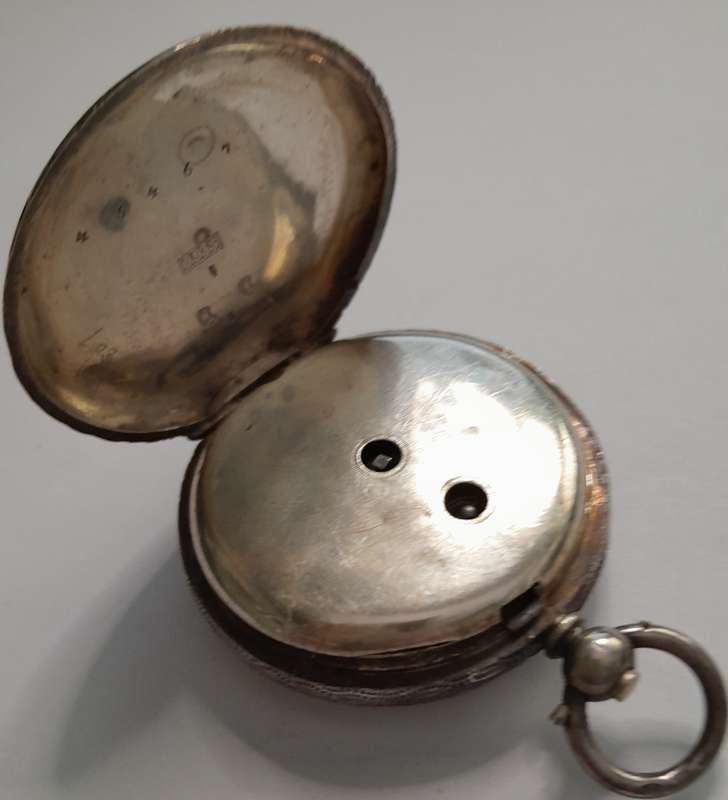Vintage silver casing decorative and ornate swiss made pocket watch