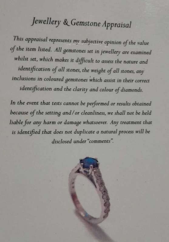 18 carat white gold diamond and blue sapphire ring