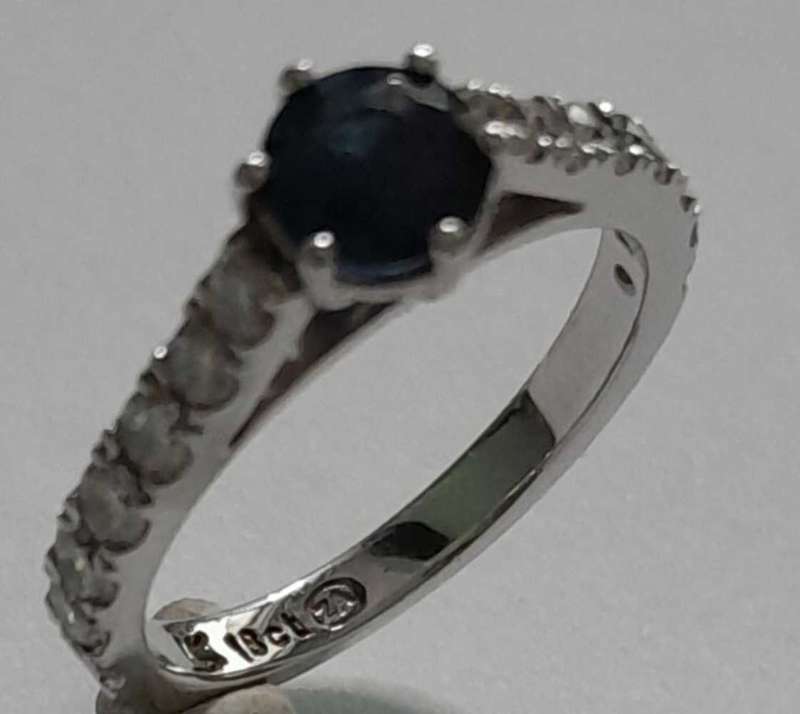 18 carat white gold diamond and blue sapphire ring