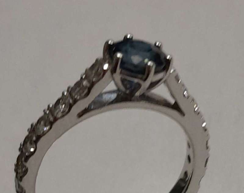 18 carat white gold diamond and blue sapphire ring