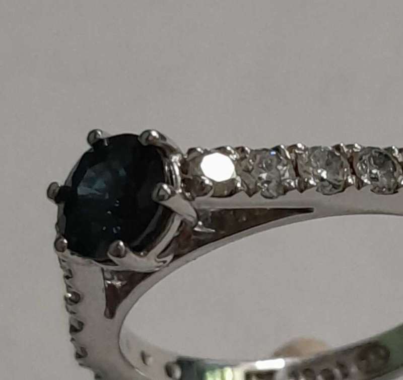 18 carat white gold diamond and blue sapphire ring