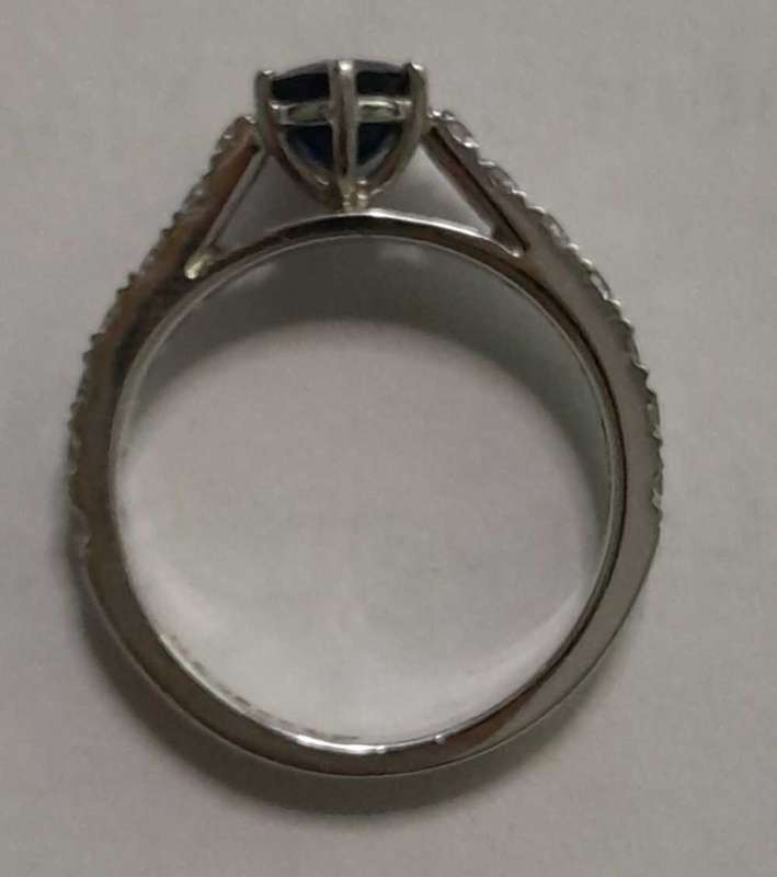 18 carat white gold diamond and blue sapphire ring