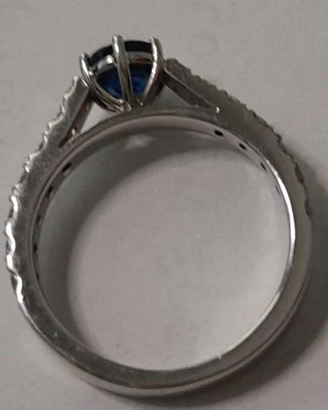 18 carat white gold diamond and blue sapphire ring
