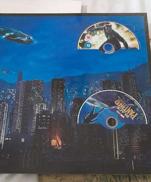 Black Panther Big Sleeve Edition and contains Exclusive 12"Art Cards