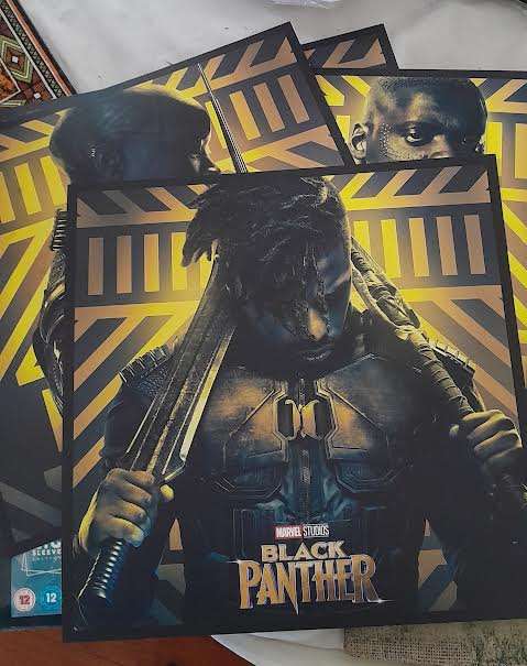 Black Panther Big Sleeve Edition and contains Exclusive 12"Art Cards