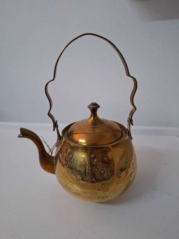 Handmade carved teapot