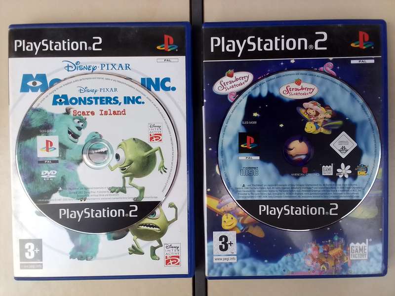PS2 Video Game bundle ("Monsters, Inc.: Scare Island", "Strawberry Shortcake: The Sweet Dreams Game"