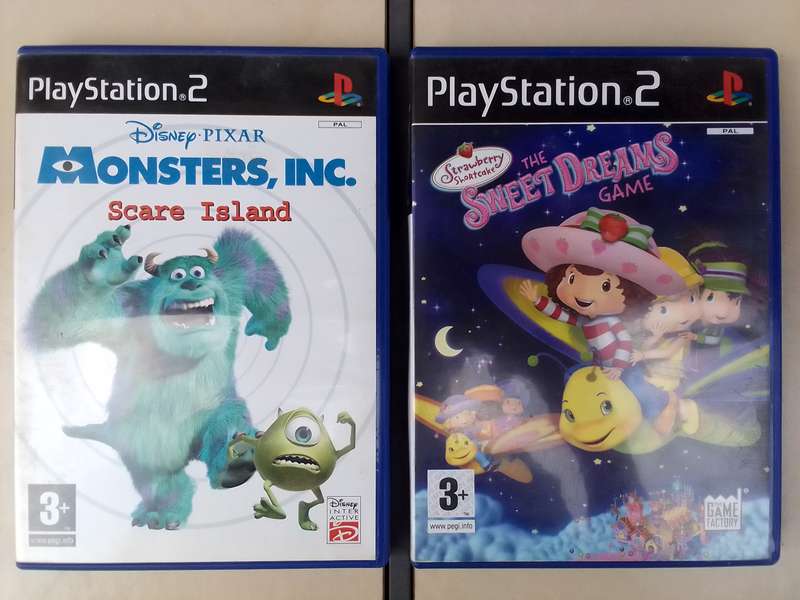 PS2 Video Game bundle ("Monsters, Inc.: Scare Island", "Strawberry Shortcake: The Sweet Dreams Game"