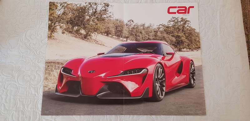 EIGHT LARGE MOTORCAR POSTERS OF POPULAR SPORTS CARS OF RECENT YEARS.