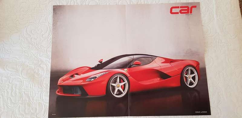 EIGHT LARGE MOTORCAR POSTERS OF POPULAR SPORTS CARS OF RECENT YEARS.