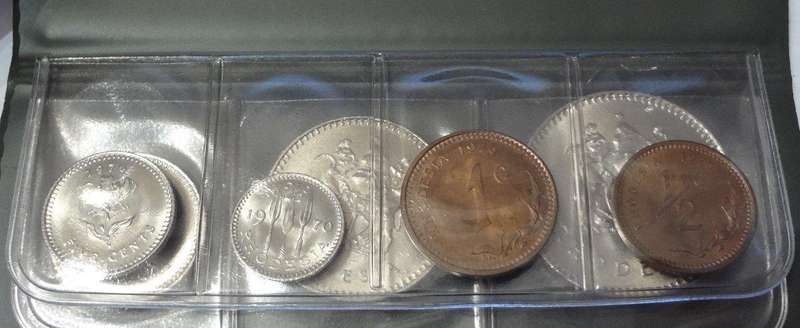 1970-1977 RHODESIA, UNCIRCULATED 7 COINS TYPE SET, ORIGINAL GREEN WALLET