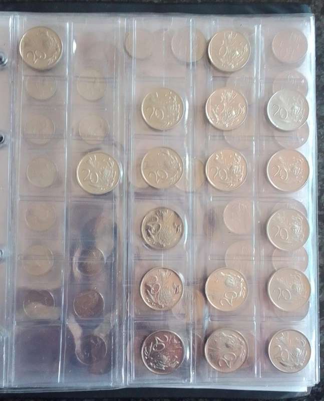 Various Old South african Coins in a File