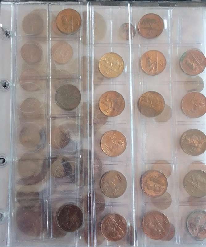 Various Old South african Coins in a File