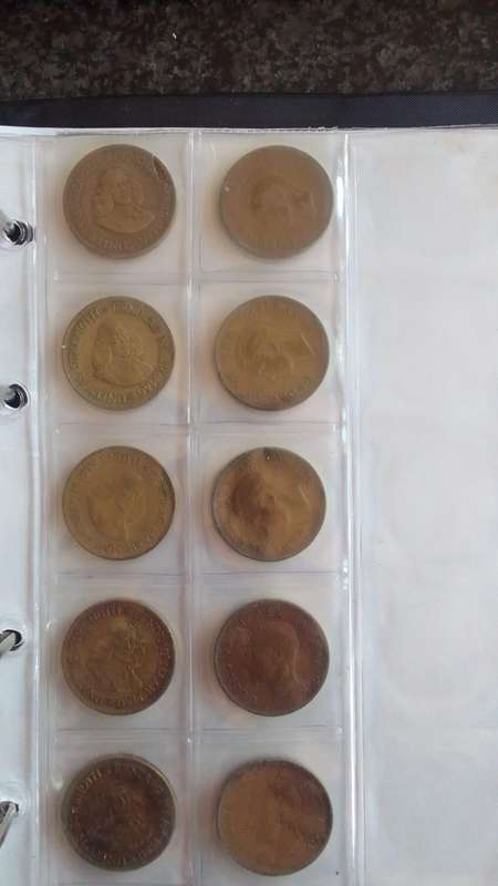 Various Old South african Coins in a File