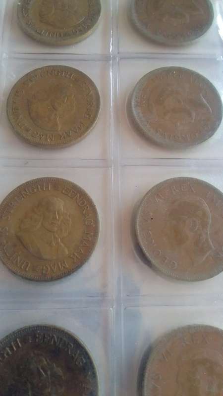 Various Old South african Coins in a File