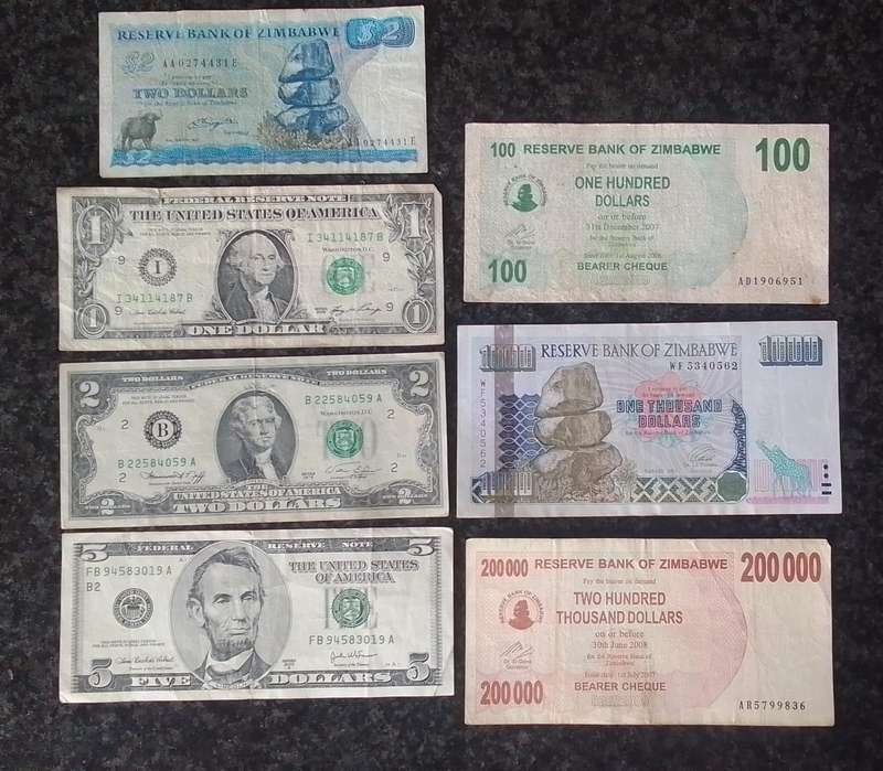 7x Mixed Dollars - Zimbabwe & USA