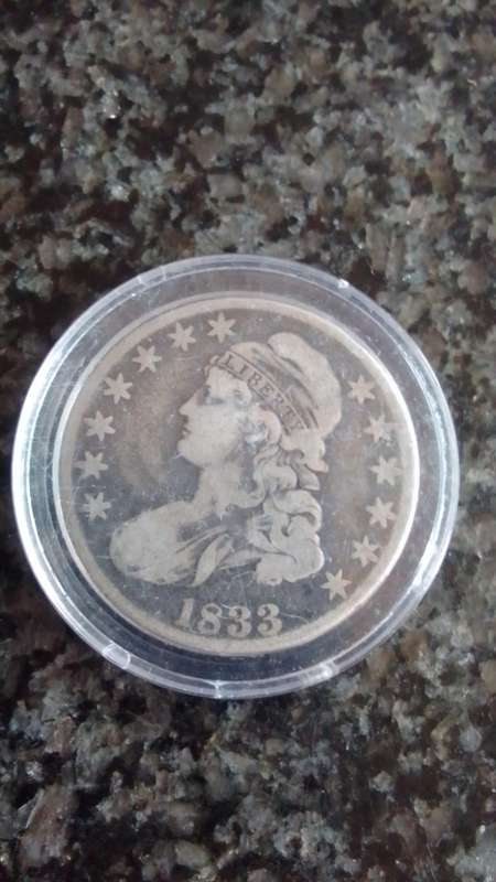 1833 US 50 cent is plastic capsule
