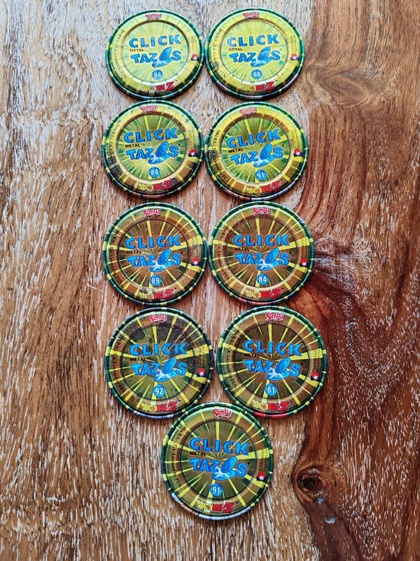 9 Vintage Click Tazos  Collectible Set