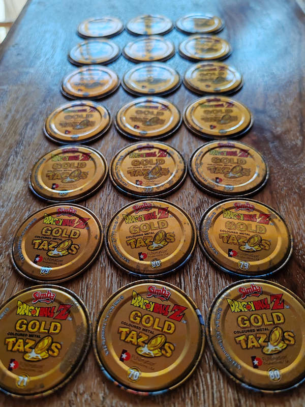 Set of 21 Gold Dragon Ball Z Tazos  Super Saiyan Collection