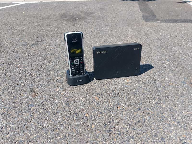 Yealink W52P Cordless phone with base, chargers, and Dect cordless handset