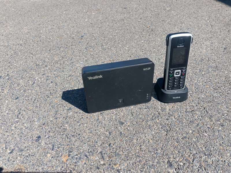Yealink W52P Cordless phone with base, chargers, and Dect cordless handset