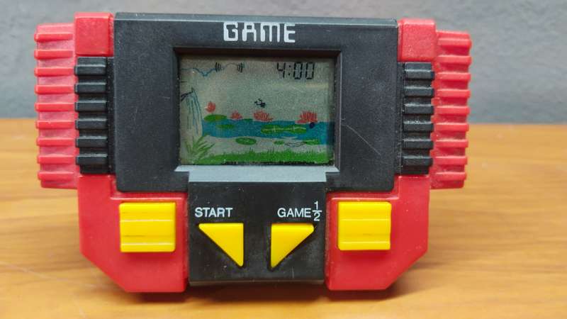 Vintage Handheld Frog Jump Game