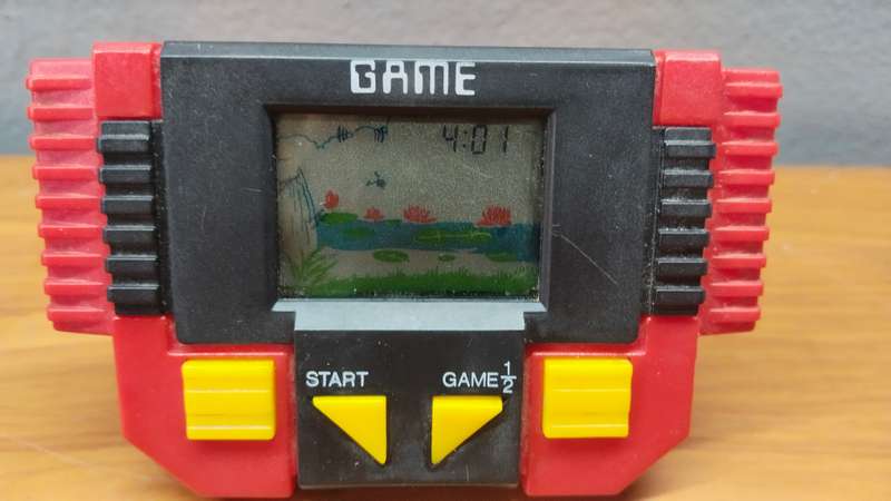 Vintage Handheld Frog Jump Game