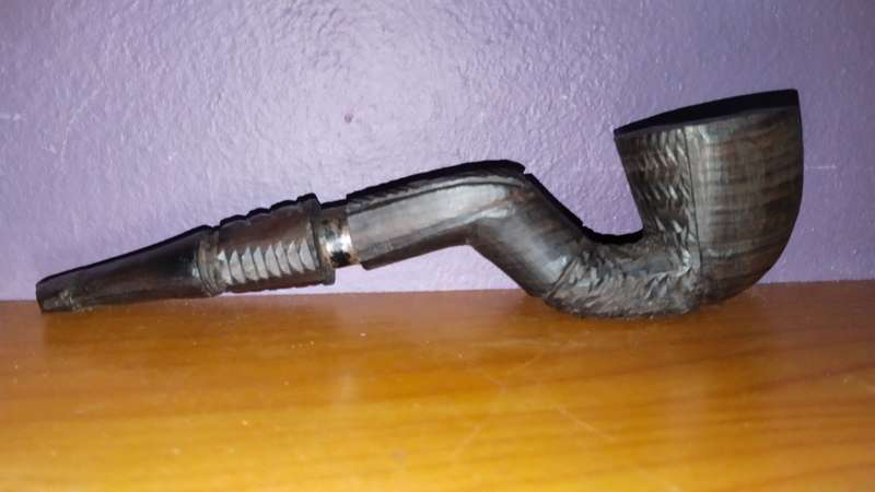 Beautiful wooden pipe, hand carved in Mozambique.