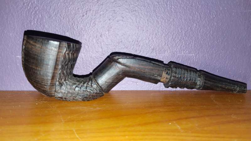 Beautiful wooden pipe, hand carved in Mozambique.