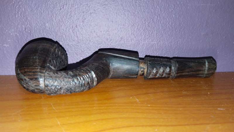 Beautiful wooden pipe, hand carved in Mozambique.