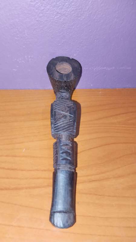 Beautiful wooden pipe, hand carved in Mozambique.