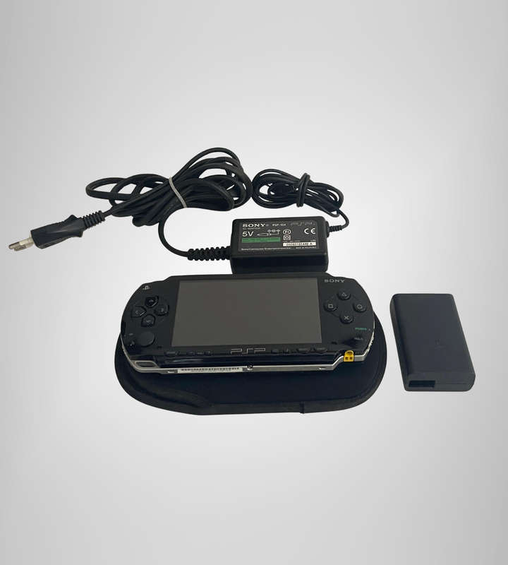Sony PSP-1004 Portable Console | No Battery | Includes Charger, Sleeve & 8GB Memory Stick | Sold As