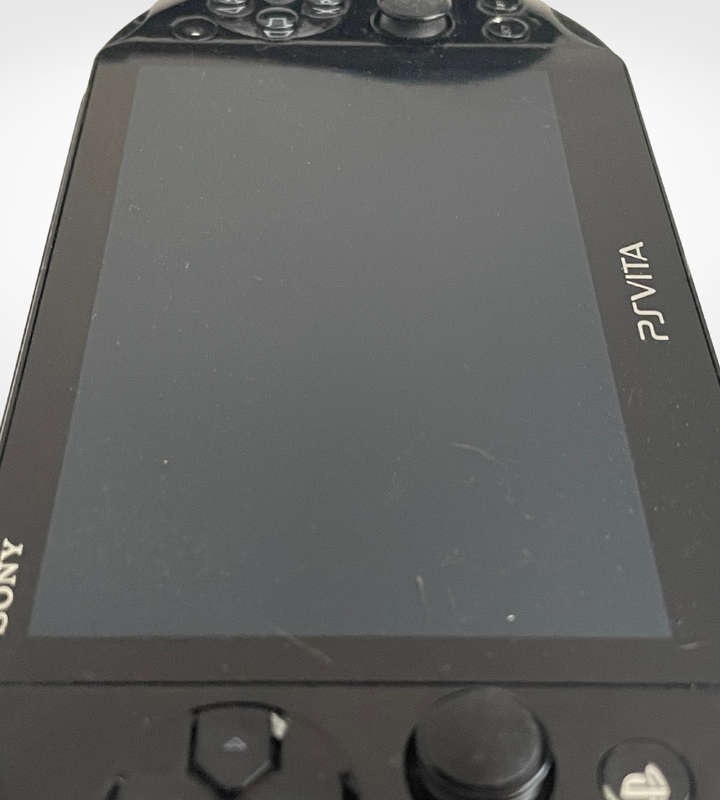 Preowned Sony PS Vita with Touch Screen  Fully Functional + Bonus Games and Accessories