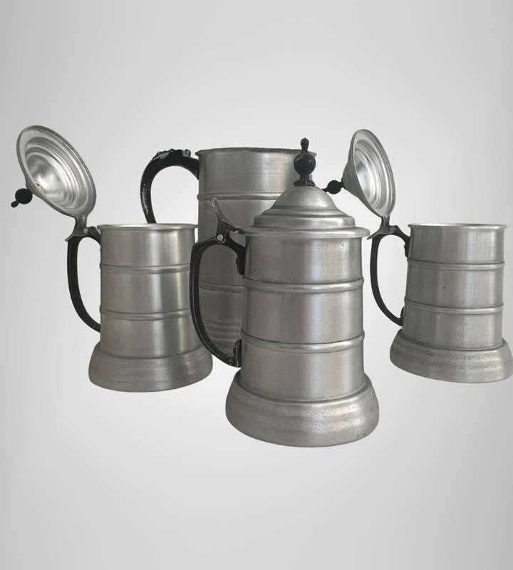 4-Piece Vintage 1970s German Style Beer Stein Set  3x Lidded Aluminum Steins + 1x Jug