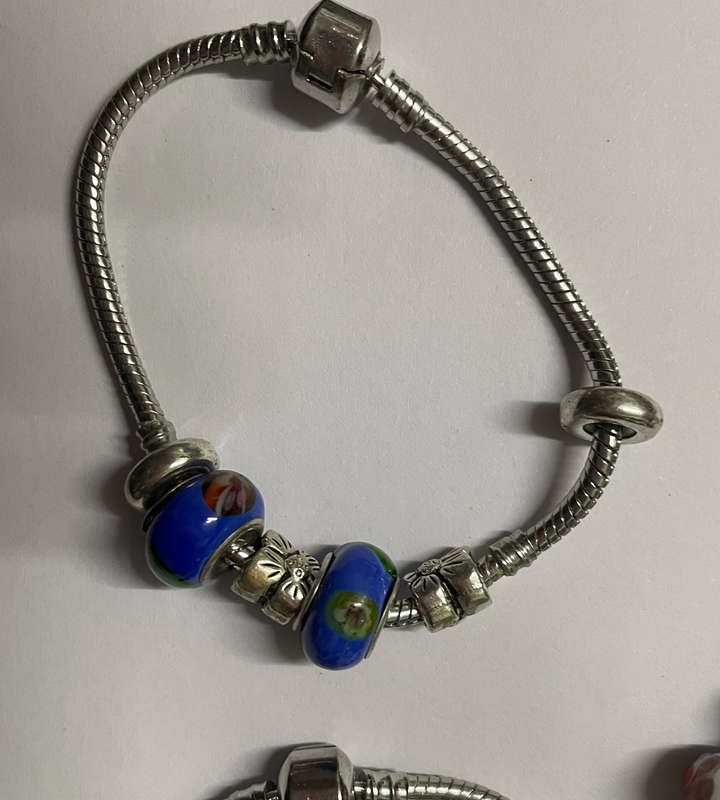 bracelets & necklace with assorted charms - 925 marked