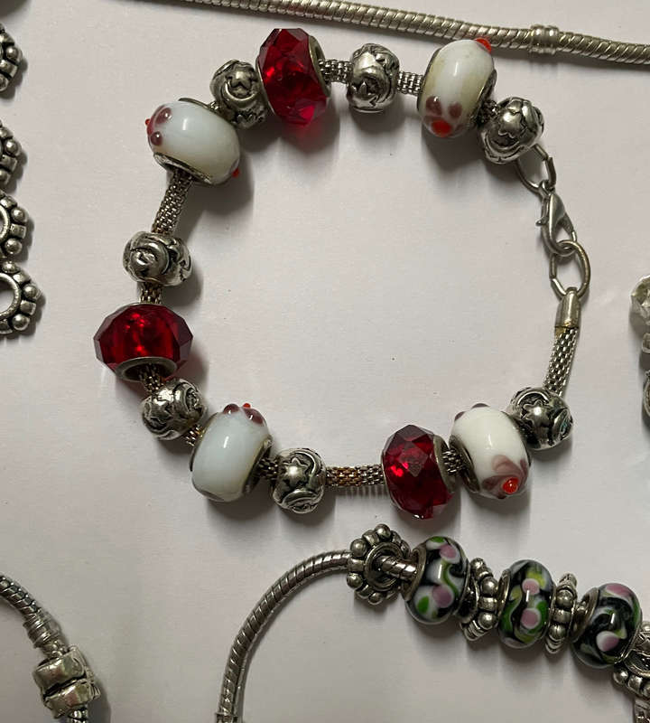 bracelets & necklace with assorted charms - 925 marked