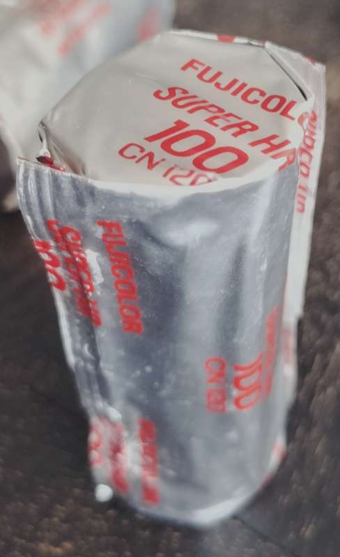 Unopened Fujicolor Super HR100 roll film spool