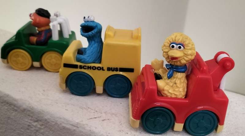 Vintage Sesame Street characters in their vehicles (x 3)