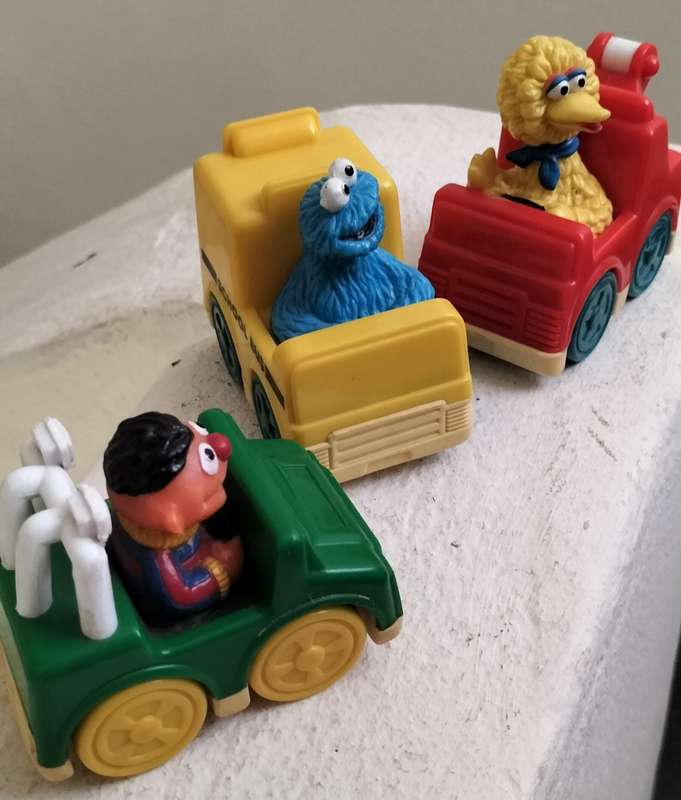 Vintage Sesame Street characters in their vehicles (x 3)