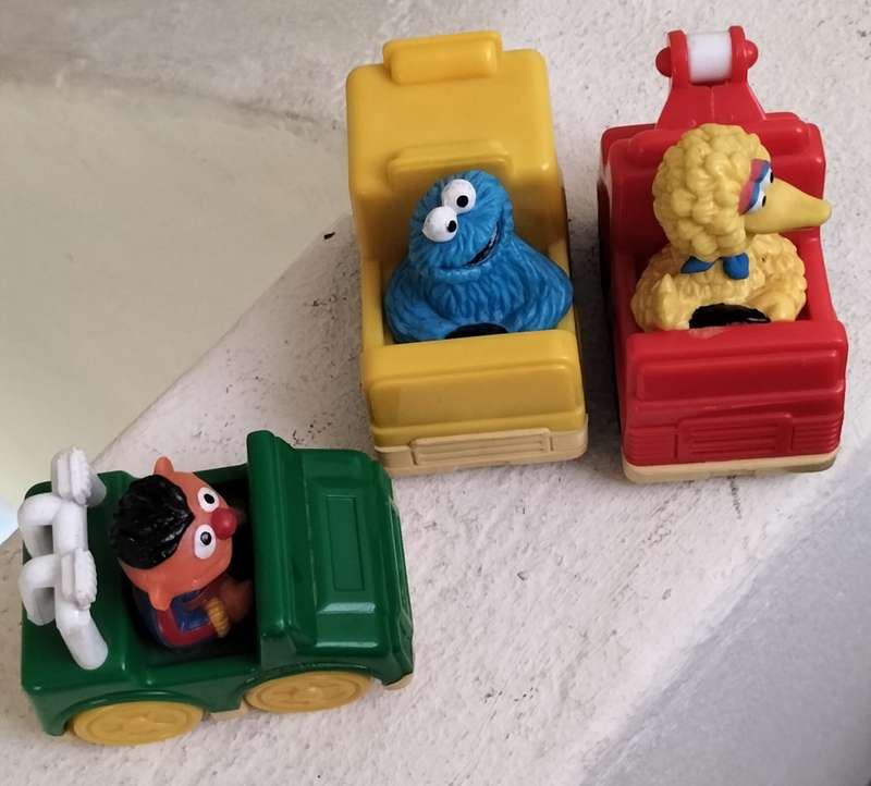 Vintage Sesame Street characters in their vehicles (x 3)
