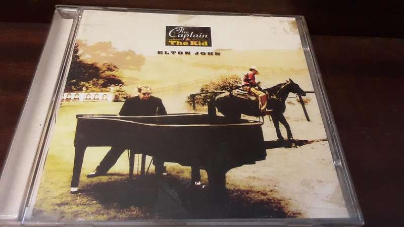 CD music  :  Elton John , captain and the kid