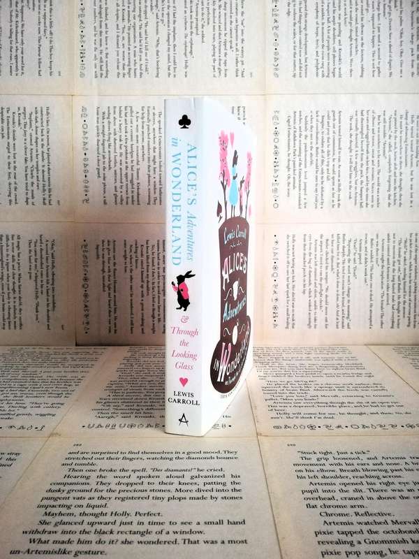 Alice's Adventures in Wonderland & Through the Looking Glass by Lewis Carroll [150th Anniversary Ed]