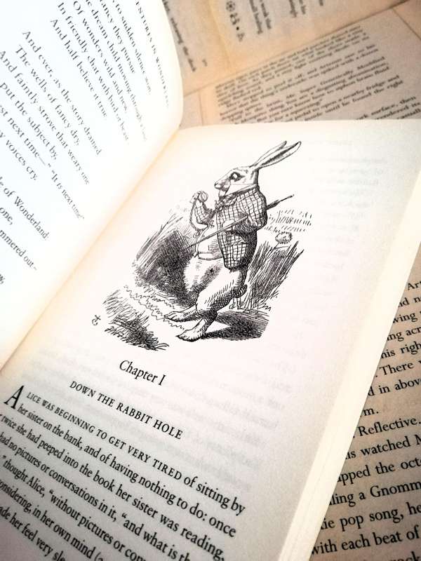 Alice's Adventures in Wonderland & Through the Looking Glass by Lewis Carroll [150th Anniversary Ed]