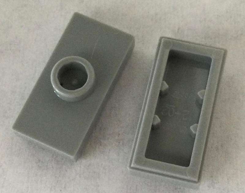LEGO Plate, Modified 1 x 2 with 1 Stud with Groove and Bottom Stud Holder (Jumper) ~ {L Bluish Grey}