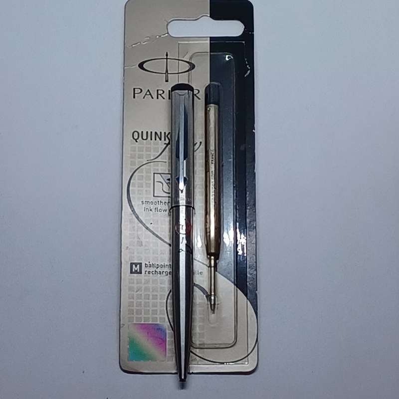 Parker Vector 2 stainless steel ball point pen with refill inside and spare refill.